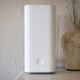 A photo of the Vilo Mesh wifi node on the author's mantle